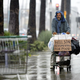 Mel Gibson begs for work on Wilshire Boulevard in Los Angeles.
